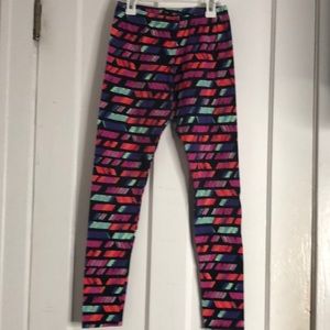 Material girl leggings with peach green blue